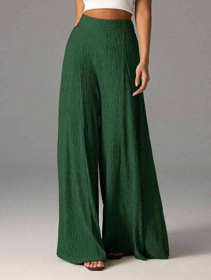 Wide pleated pants for women with high waist and elastic waistband Lune London