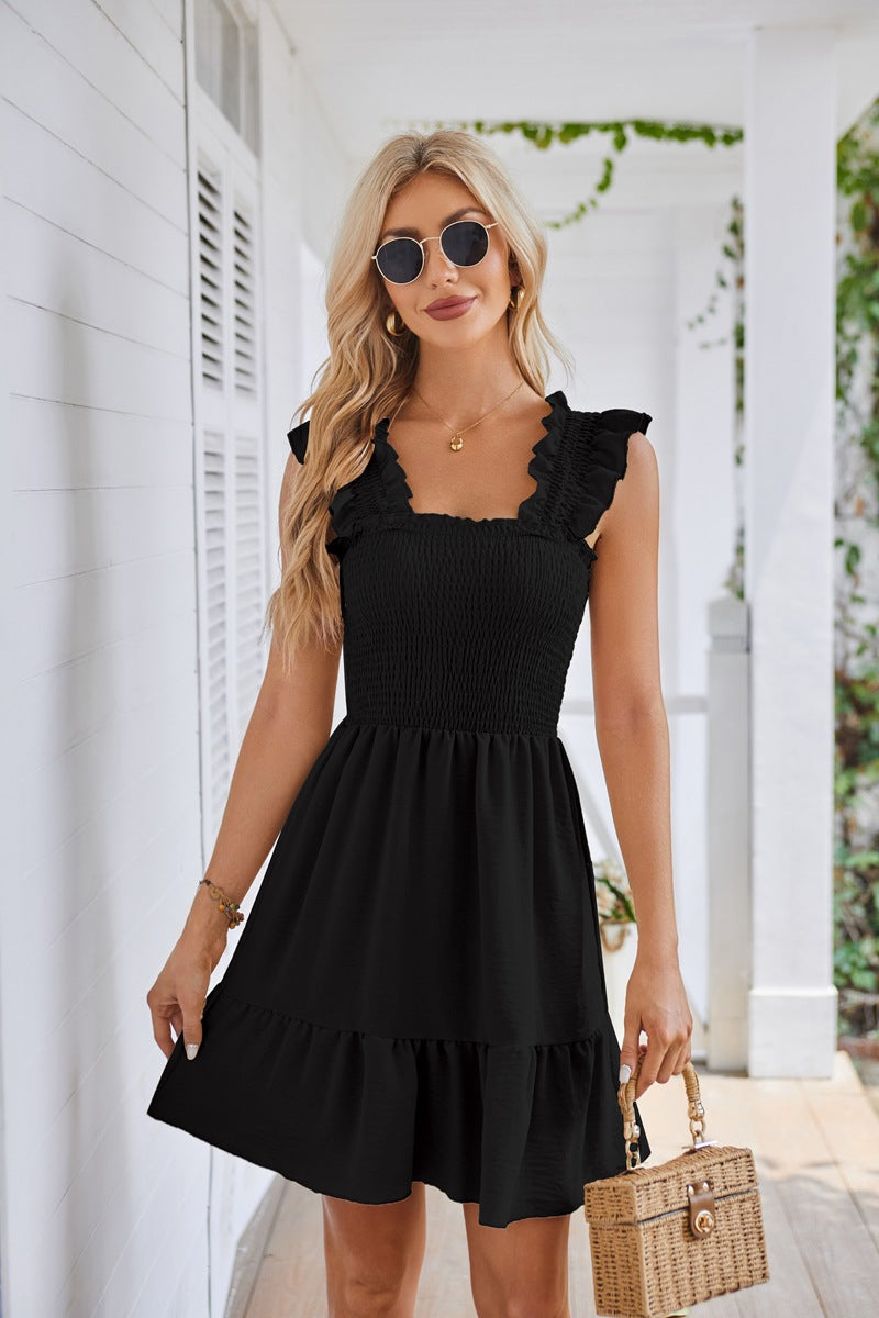 Summer mini dress for women with ruffle details and a fitted cut Lune London