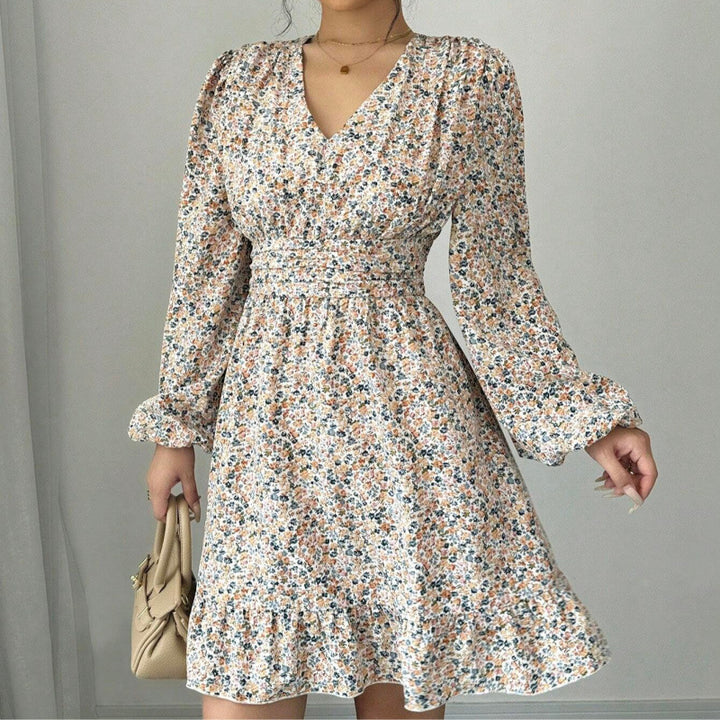 Mini dress adorned with flowers for women with deep V-neck and voluminous sleeves Lune London