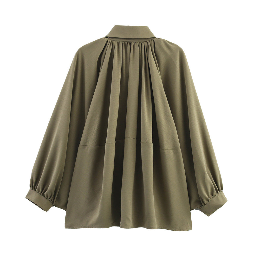Oversized blouse for women with refined draping and an elegant button detail Lune London