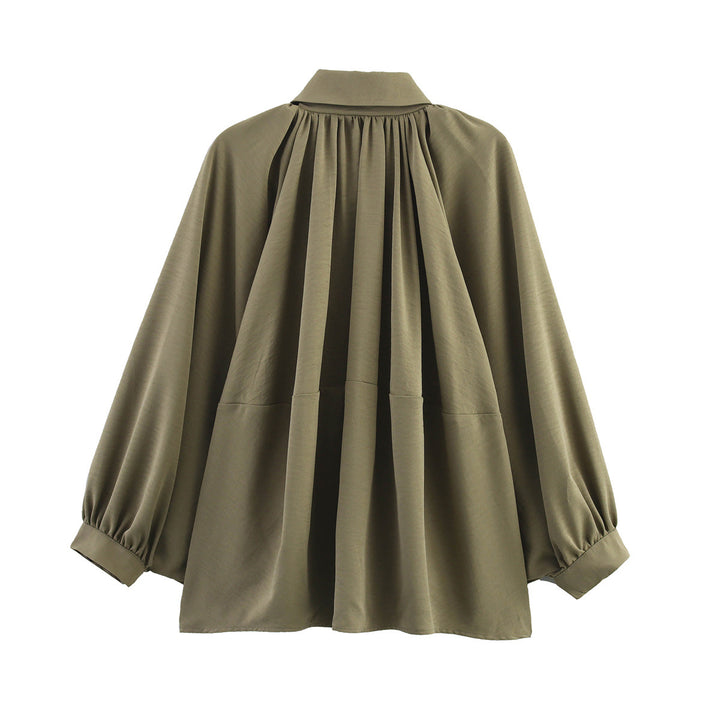 Oversized blouse for women with refined draping and an elegant button detail Lune London