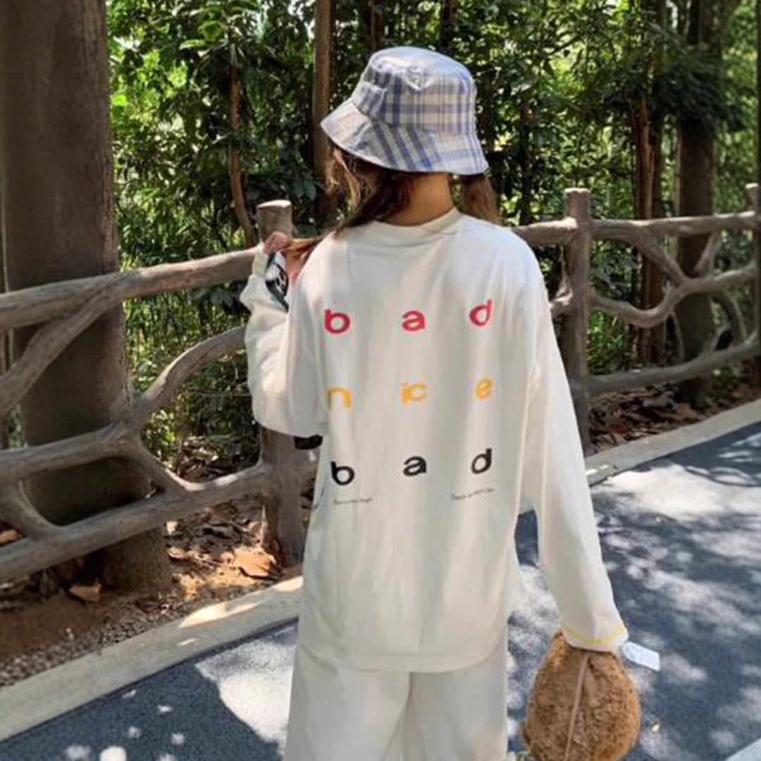 Women's casual oversized sweatshirt with colorful accent stripes Chic & Stil