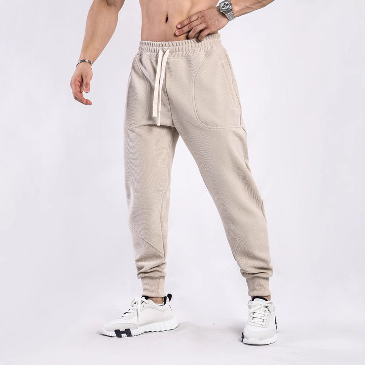 Men's sporty jogger pants with breathable inserts and elastic waistband Lune London