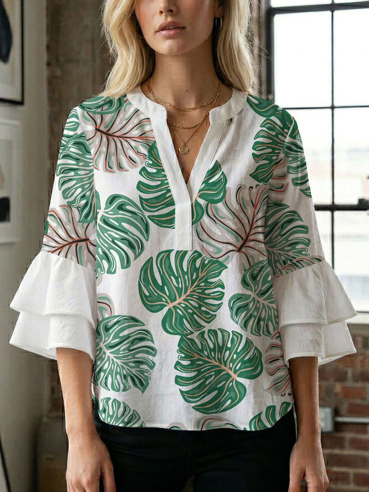 Women's blouse with voluminous wing sleeves and intense leaf pattern Lune London