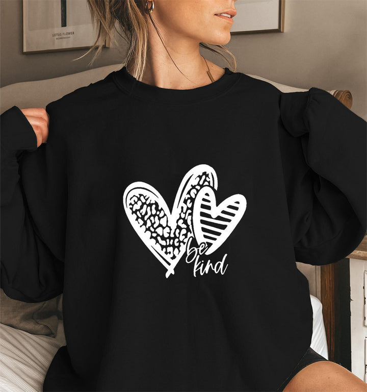 Sweat-shirt femme avec motif de cœur à la mode et coupe décontractée Chic & Stil