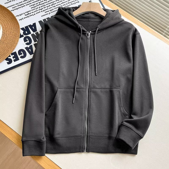 Veste à capuche zippée sportive pour femme avec poches kangourou pratiques Chic & Stil