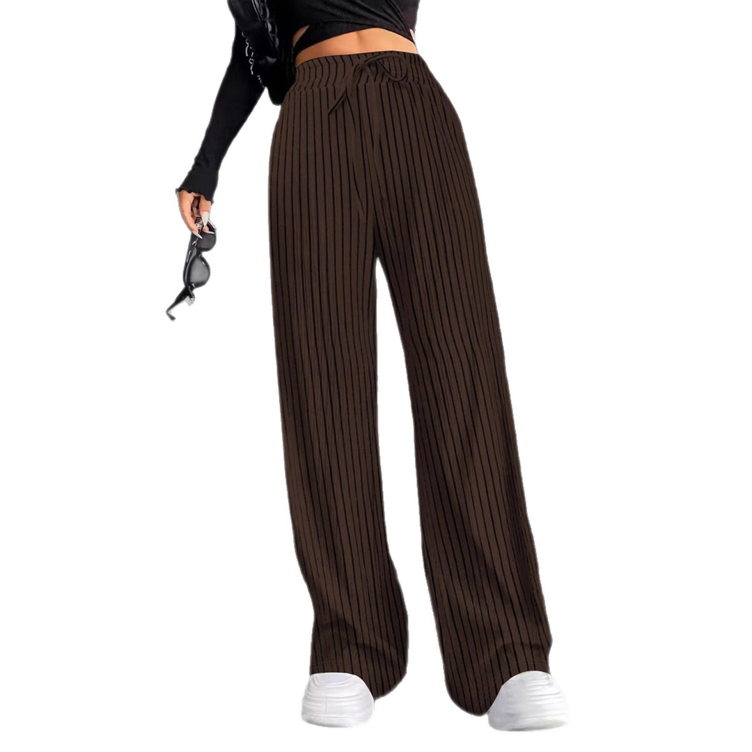 Pantalons plissés à coupe large pour femmes avec taille élastique et poches latérales pratiques Chic & Stil