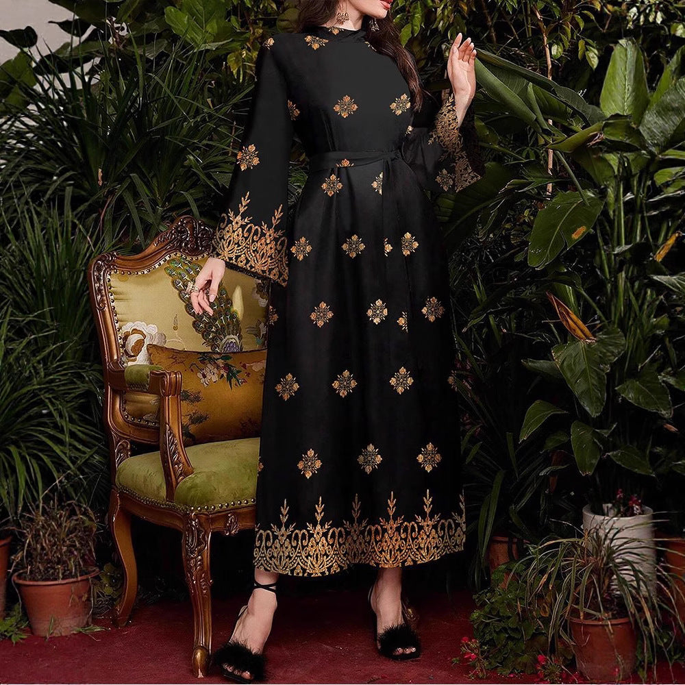 Evening party dress for women with an elegant gold and floral pattern Lune London