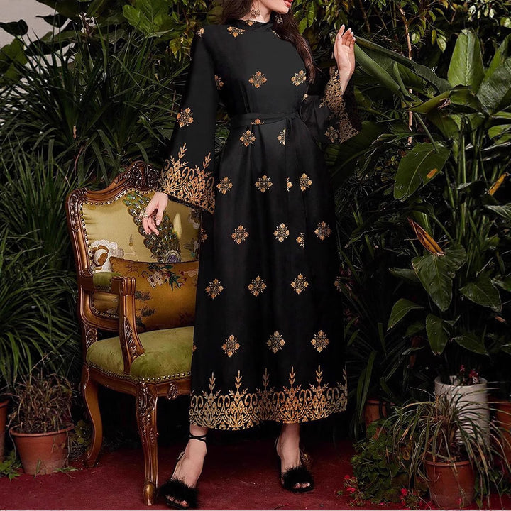 Evening party dress for women with an elegant gold and floral pattern Lune London