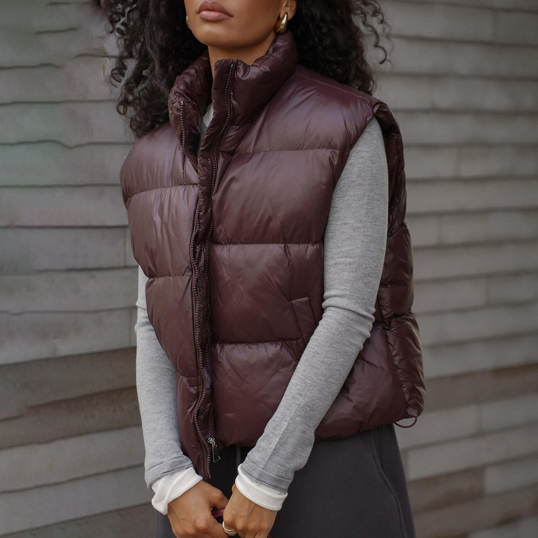 Quilted women's vest with high collar and practical zipper Lune London