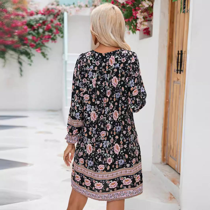 Ladies playful floral dress with flounced sleeves and V-neck Lune London