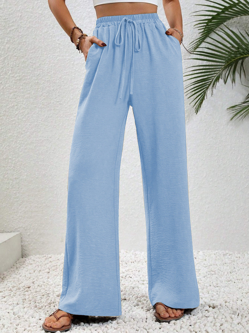 Pantalons larges d'été pour femmes avec taille élastique et poches latérales pratiques Chic & Stil