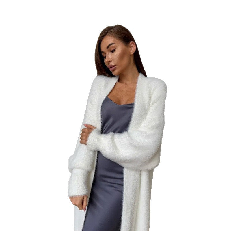 Manteau long en tricot duveteux pour femme avec une coupe élégante et des manches amples Chic & Stil