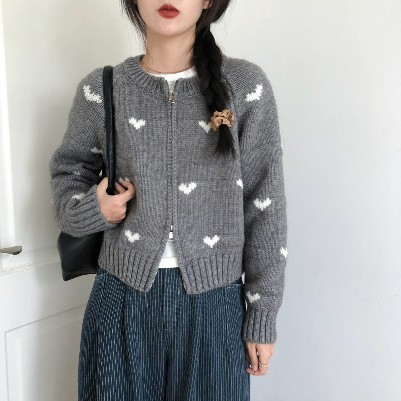Ladies comfortable cardigan with heart pattern and chic style elegant button detail