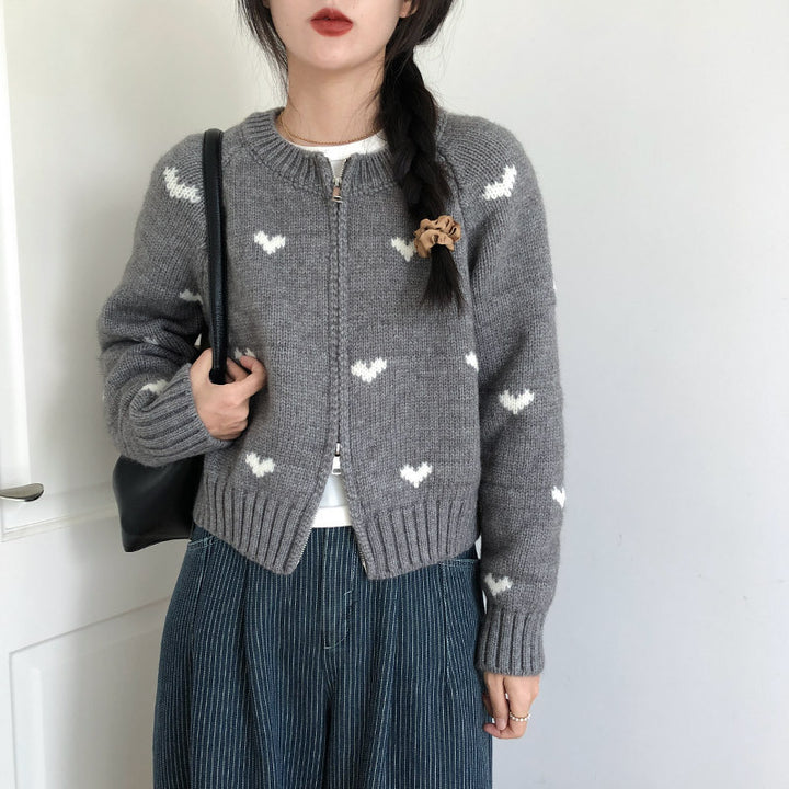 Ladies comfortable cardigan with heart pattern and chic style elegant button detail