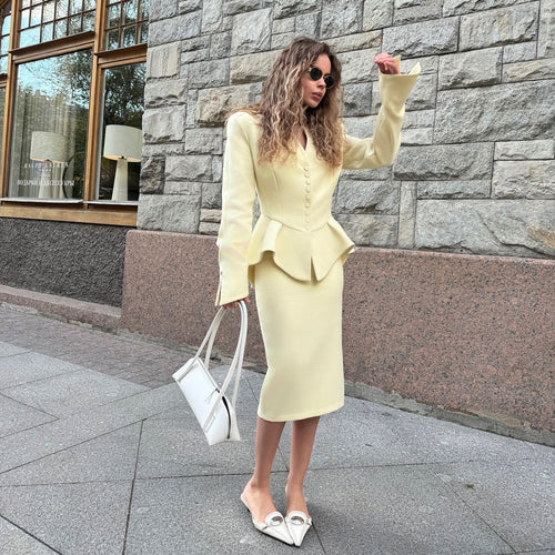 Ladies Elegant Sheath Dress with a chic peplum design Lune London