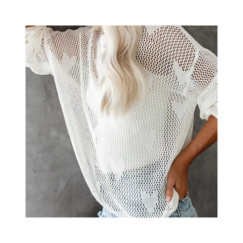 Ladies Oversized Knit Pullover with Heart Pattern and Chic Airy Structure