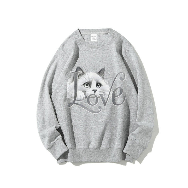 Sweat-shirt pour femmes avec un design de chat ludique et une coupe décontractée Chic & Stil