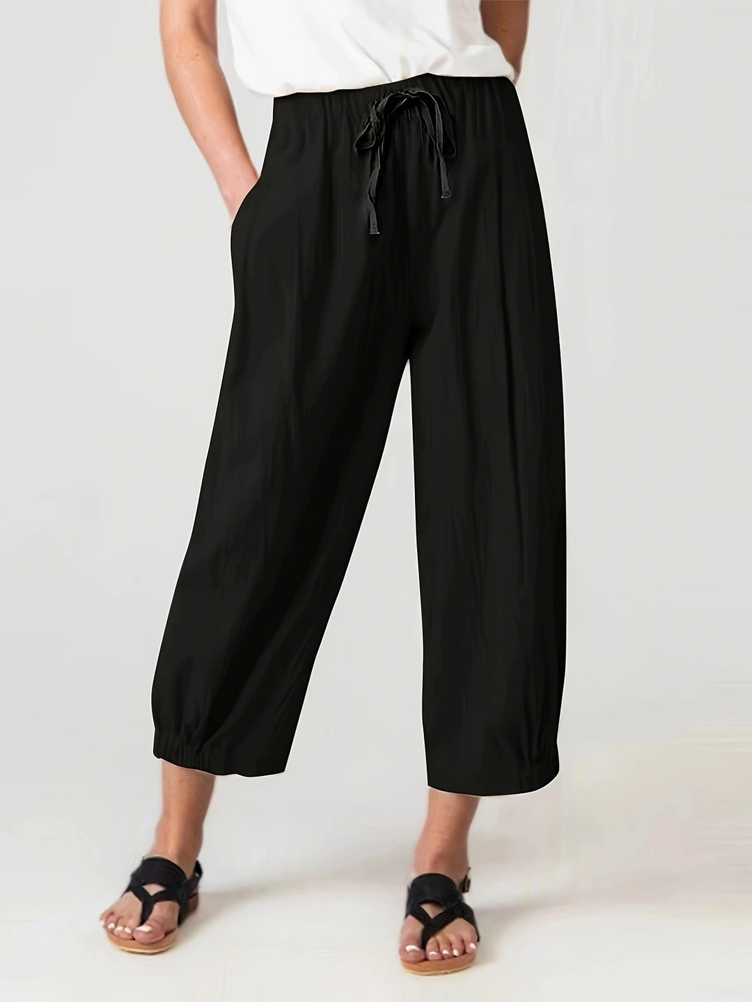 Wide linen trousers for women with elastic waistband and practical pockets Lune London