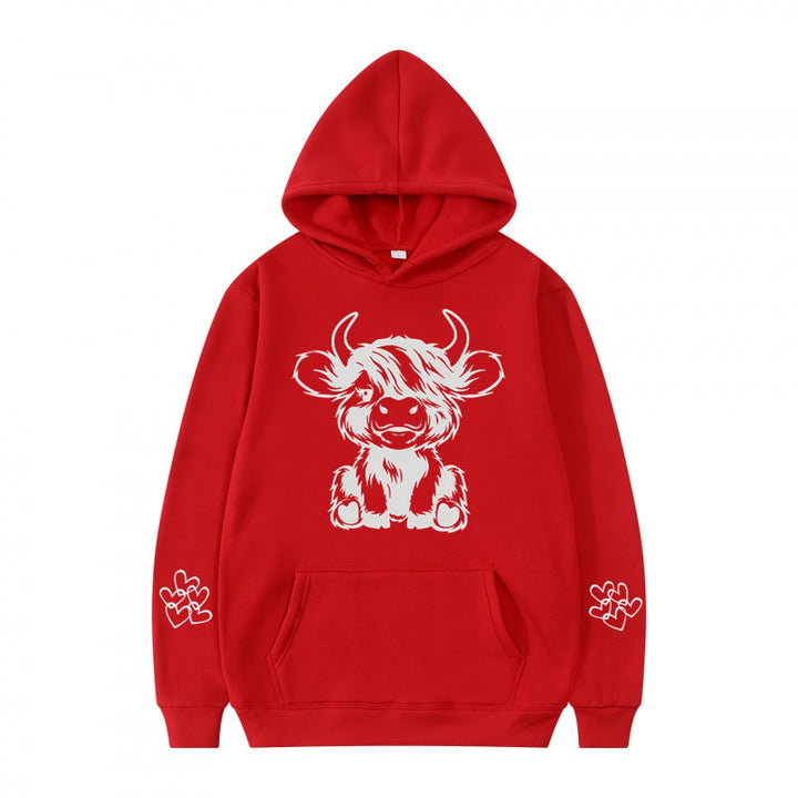 Women's hooded sweatshirt with charming cow motif and practical kangaroo pockets Lune London