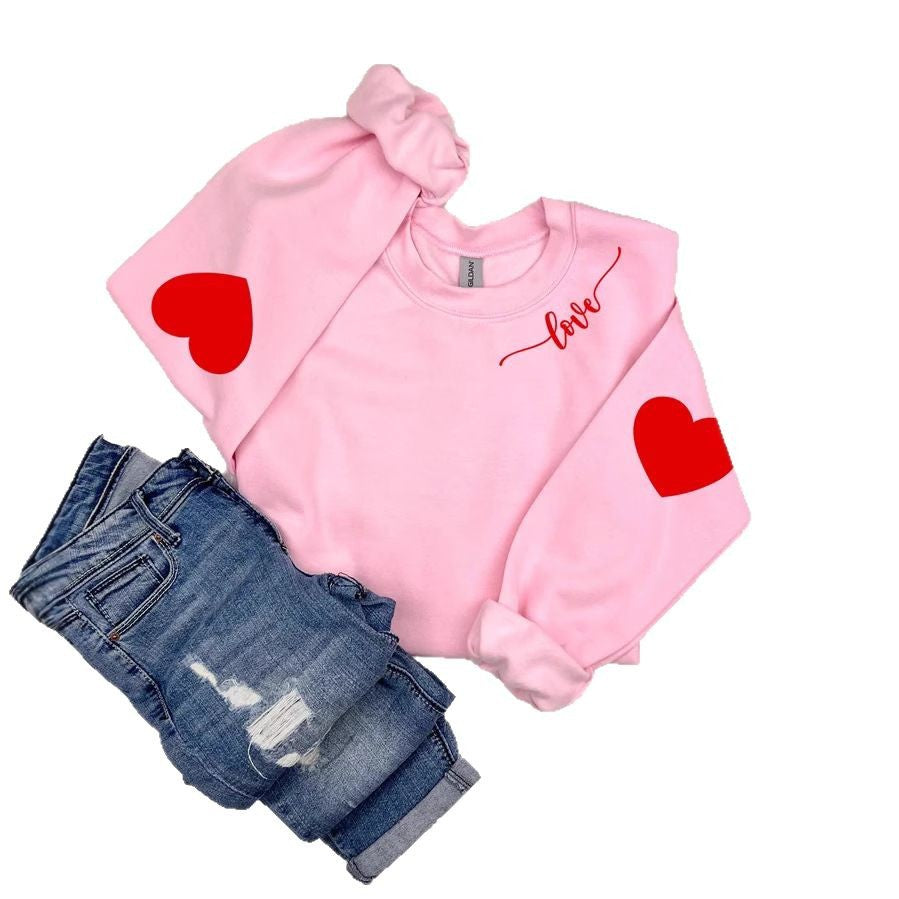 Sweatshirt femme avec design cœur et coupe décontractée Chic & Stil