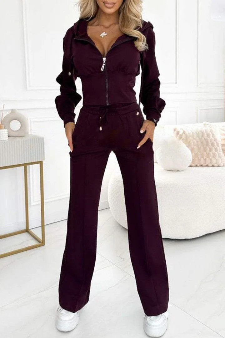 Women's sports jumpsuit set with high collar and practical pockets Lune London