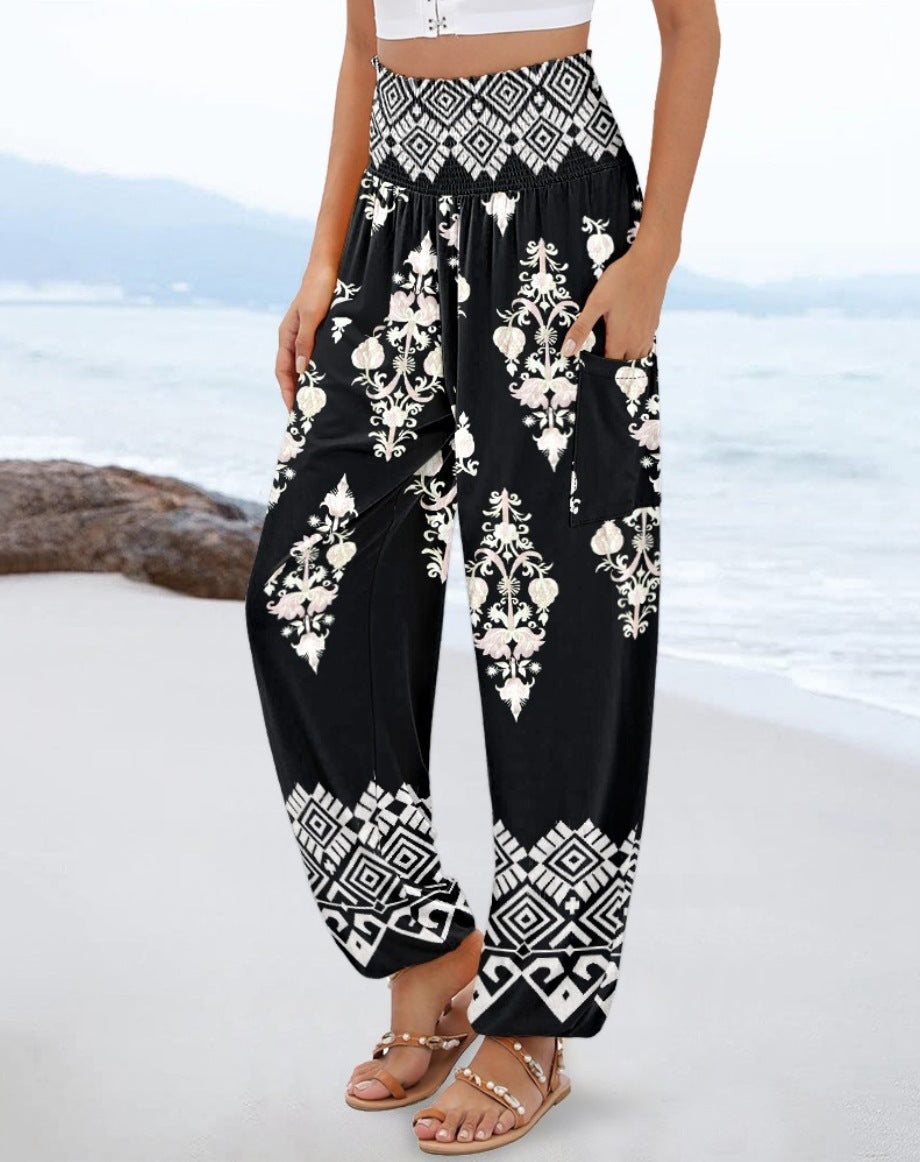 Wide Palazzo pants for women with colorful Paisley pattern and elastic waistband Lune London