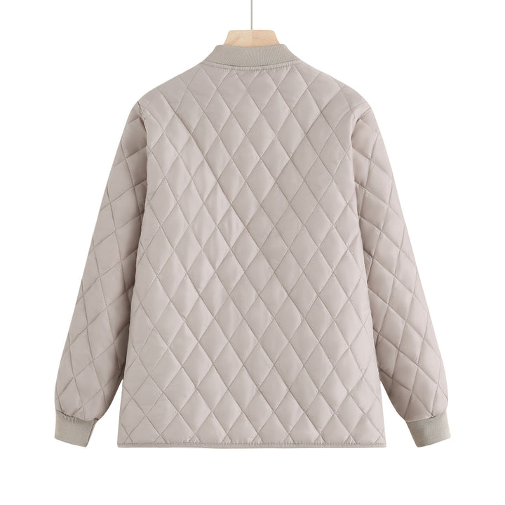 Women's quilted transition jacket with practical pockets and elastic cuffs Lune London