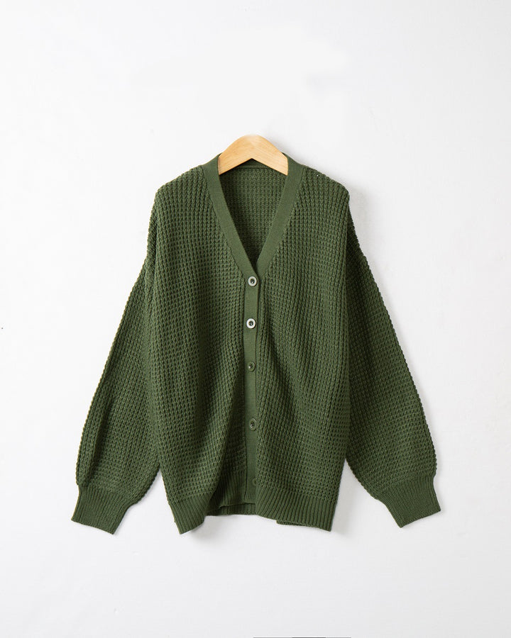 Women's knitted jacket with structured pattern and practical button details Lune London