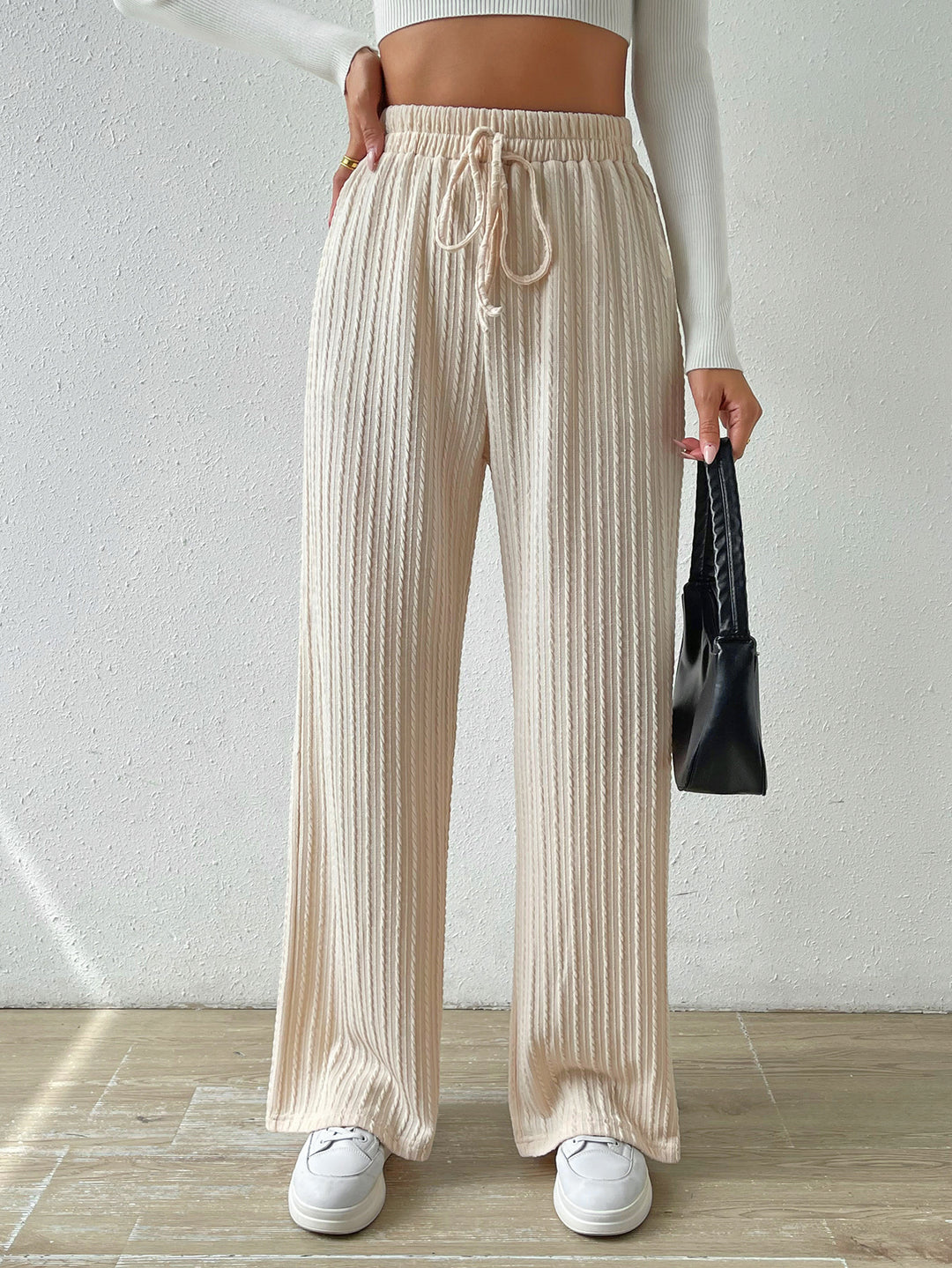 Loose knit pants for women with elastic waistband and trendy longitudinal structure Lune London