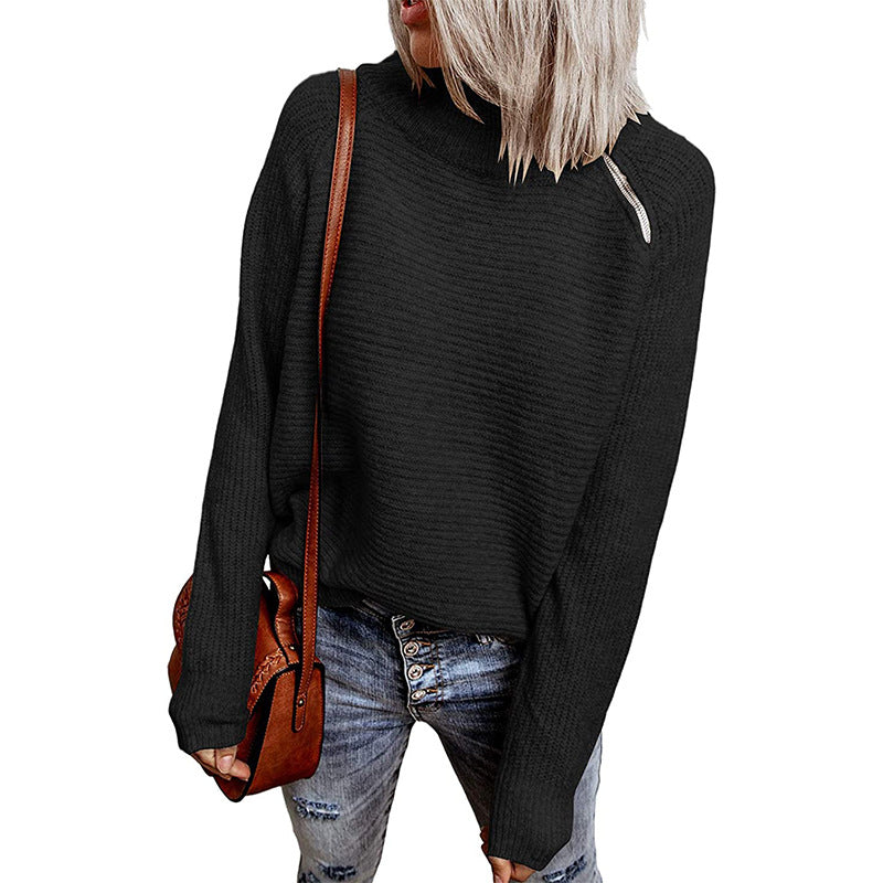 Trendy oversized women's sweater with stylish high collar and raglan sleeves Lune London