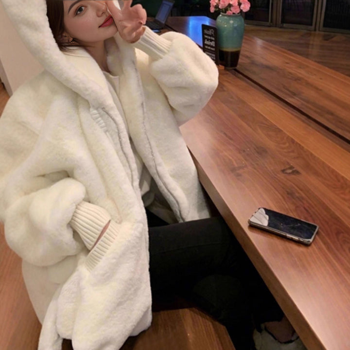 Manteau en peluche pour femmes avec coupe généreuse et col montant Chic & Stil