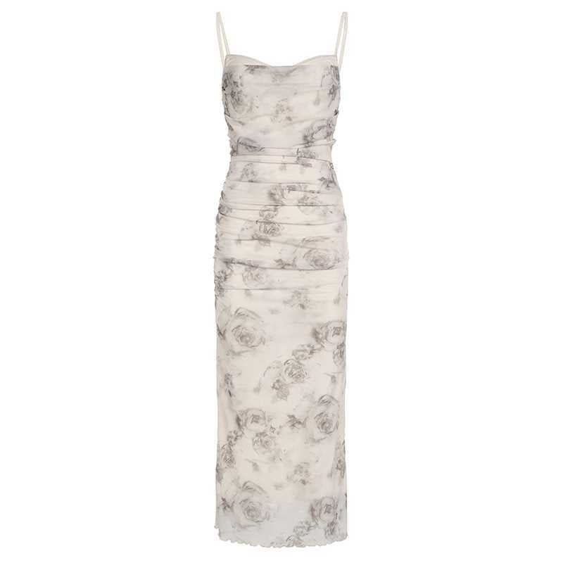 Elegant maxi dress for women with refined ruffle details and a chic floral print.