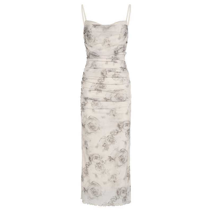Elegant maxi dress for women with refined ruffle details and a chic floral print.