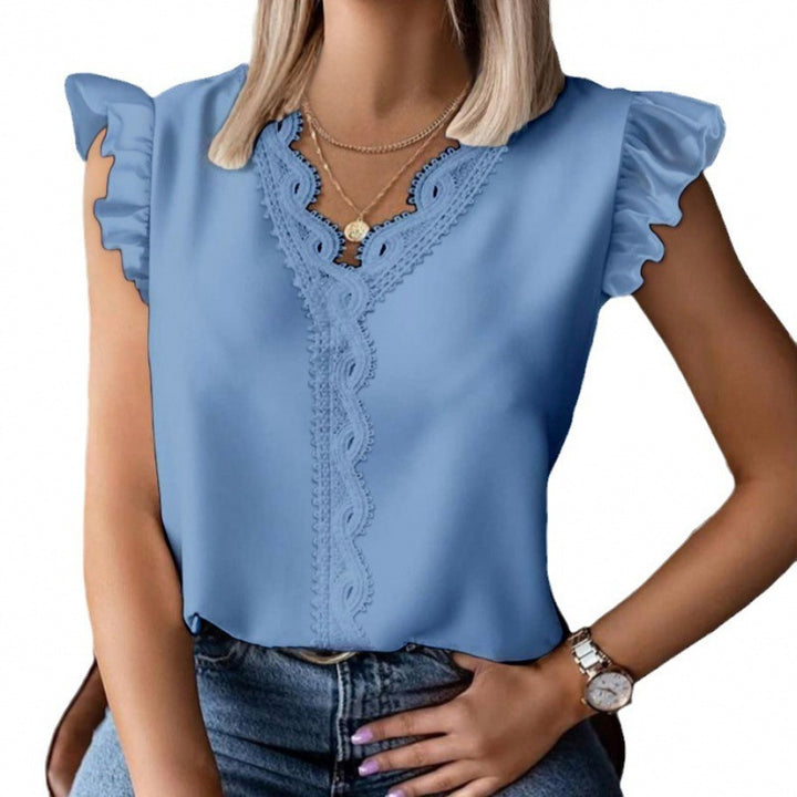 Women's blouse with ruffle details and lace appliqués Lune London