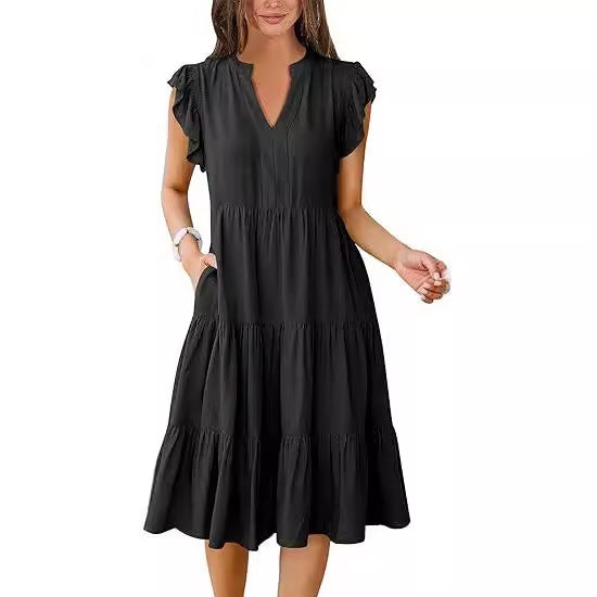Leisure dress for women with ruffled details and pockets Lune London