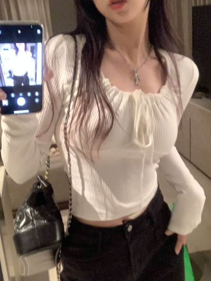 Women's fitted long sleeve top with sophisticated cord detail Chic & Stil