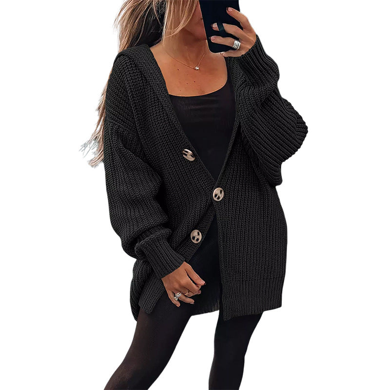 Thick knit jacket for women with an oversized fit and stylish wooden buttons Lune London