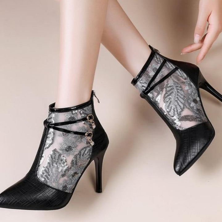 Elegant ankle boots for ladies with a transparent upper material and sparkling applications Lune London