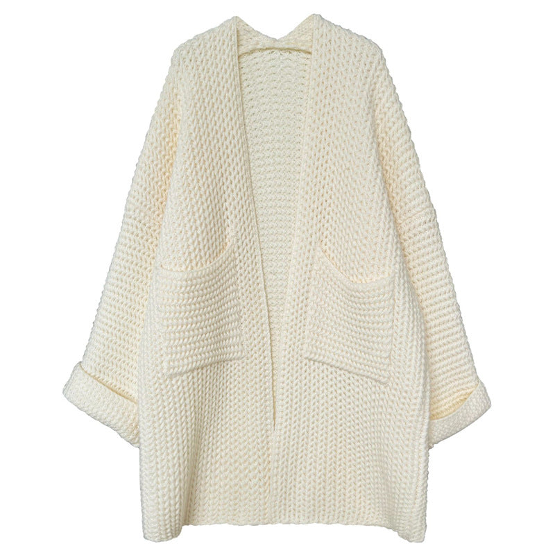 Women chunky knit with practical pockets and trendy embossed pattern Lune London