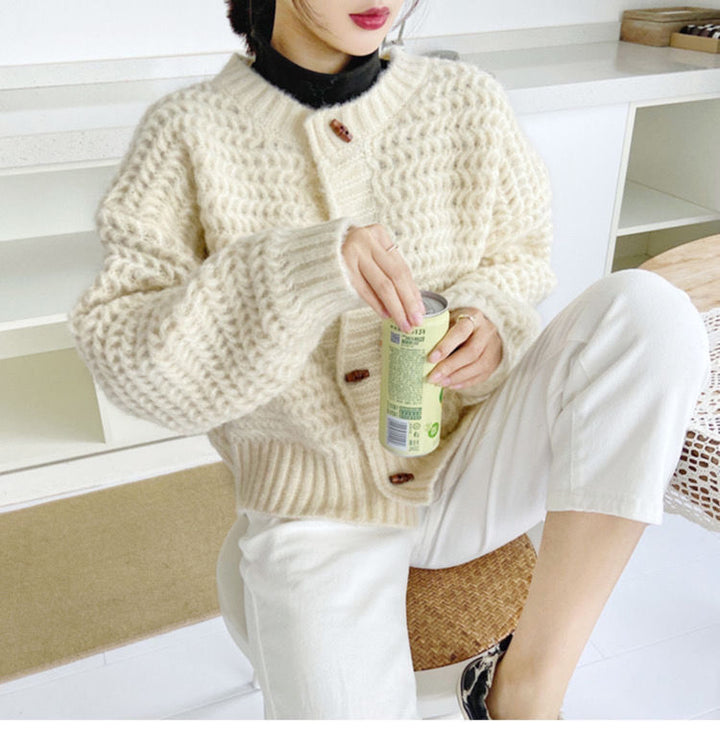Chunky knit sweater for women with decorative button placket and honeycomb pattern Lune London