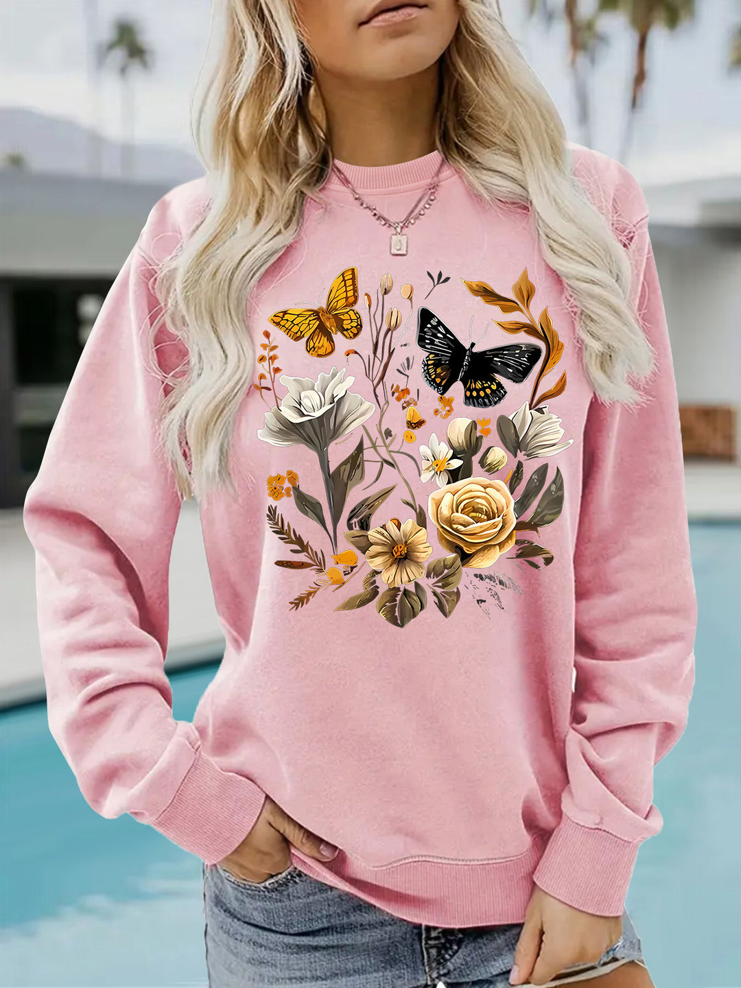 Sweat-shirt femme avec imprimé floral et coupe décontractée Chic & Stil