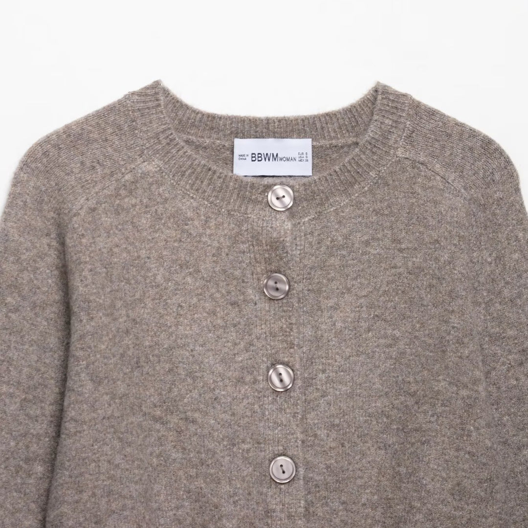 Short knitted jacket for women with fine buttons and an elegant cut Lune London