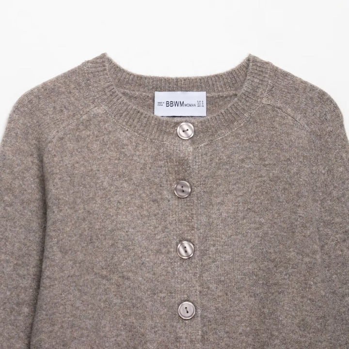 Short knitted jacket for women with fine buttons and an elegant cut Lune London