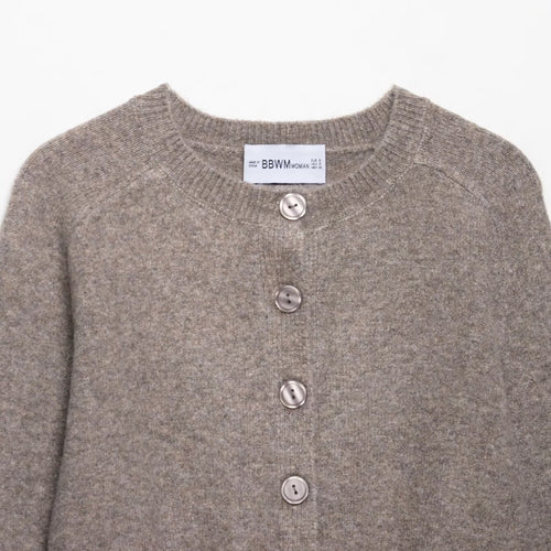 Short knitted jacket for women with fine buttons and an elegant cut Lune London