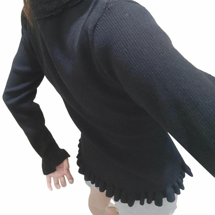 Women's knitted top with romantic lace and ruffle details Lune London