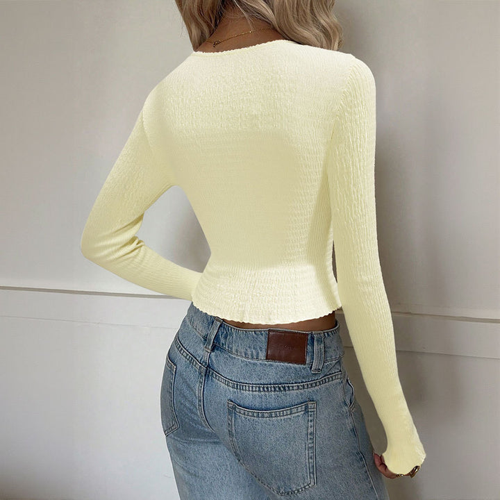 Top élégant pour femmes avec détails à volants et décolleté en V profond Chic & Stil