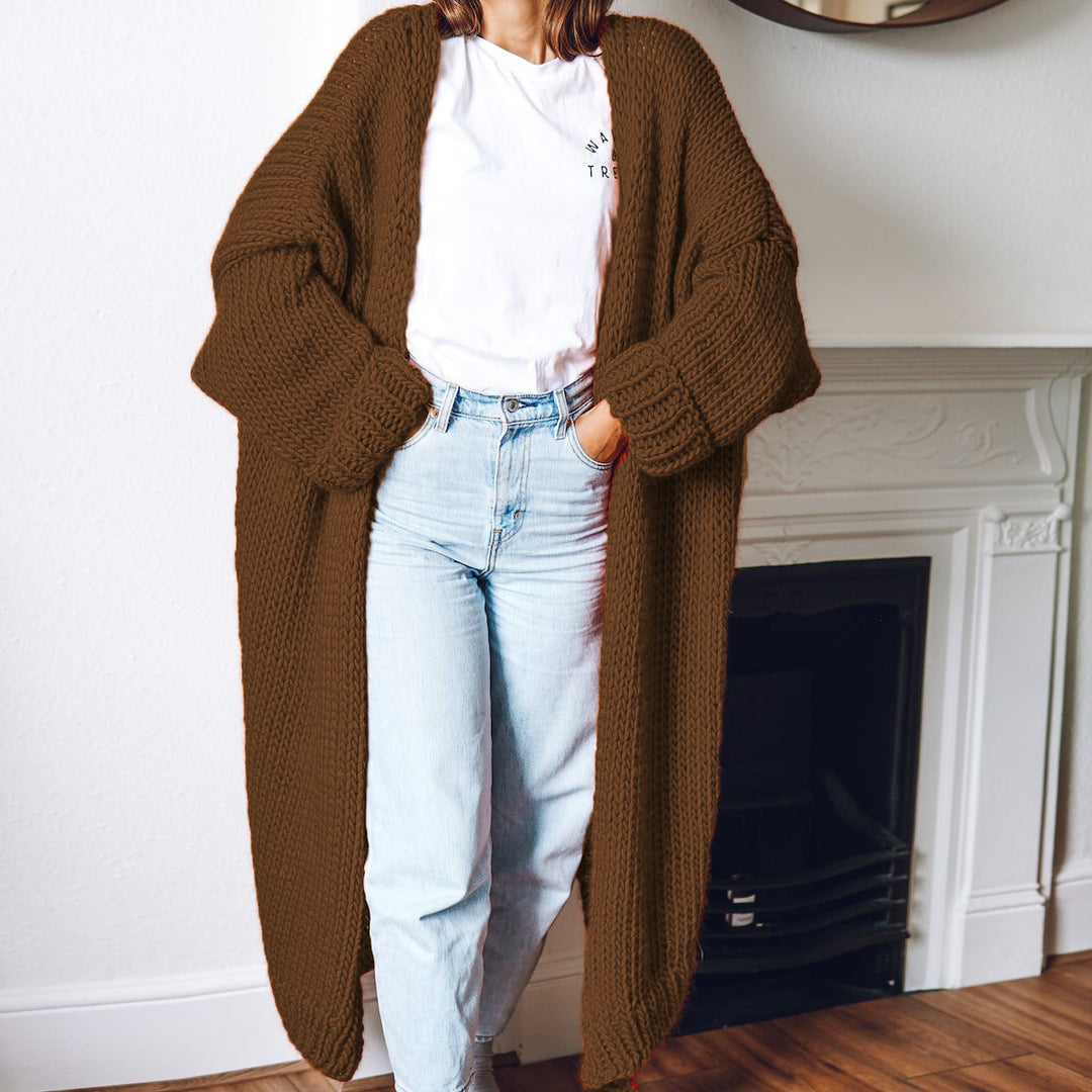 Women Large knitted coat with deep pockets and voluminous sleeves Lune London
