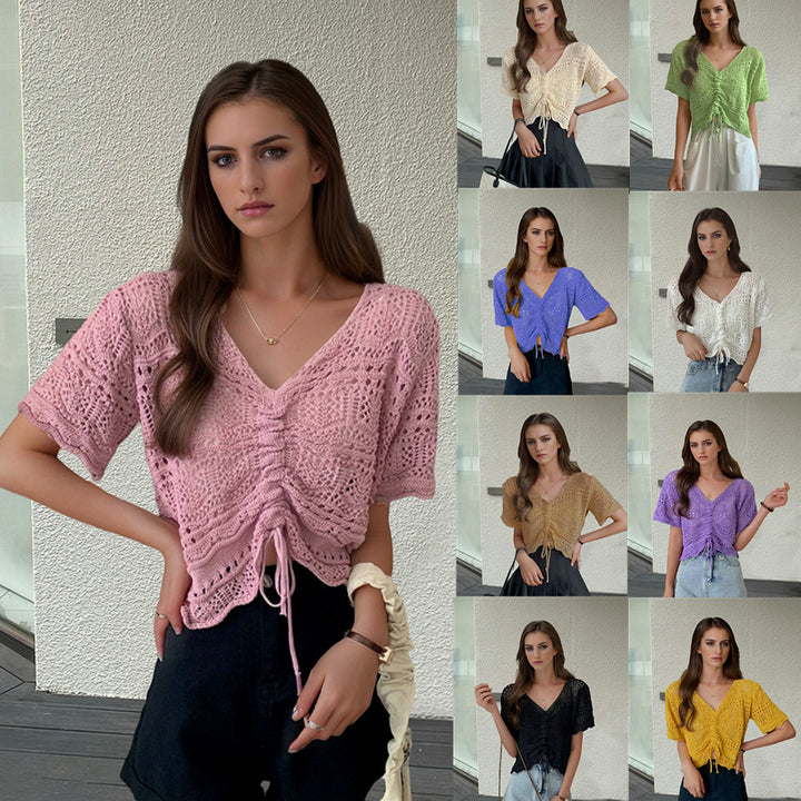 Women's knit top with decorative hole pattern and adjustable hem Lune London