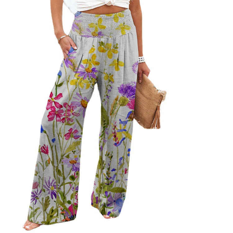 Summer wide trousers for women with a floral design and an elastic waistband Lune London
